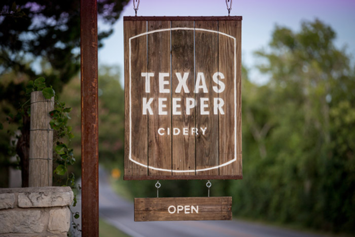 Welcome sign at TX Keeper Cidery